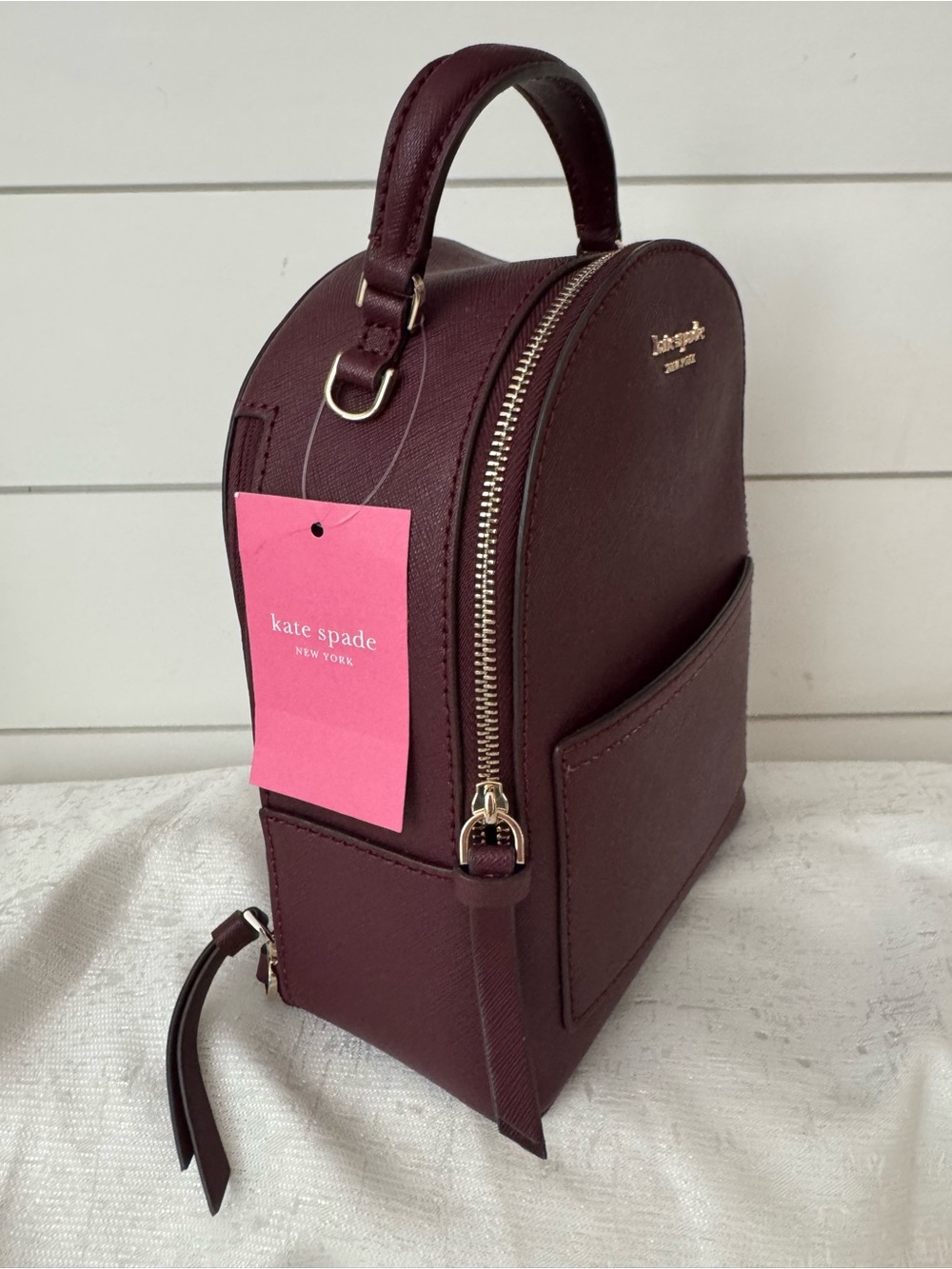 Kate Spade Cameron Mini Convertible Leather Backpack in the color cherrywood - Picture 6 of 11